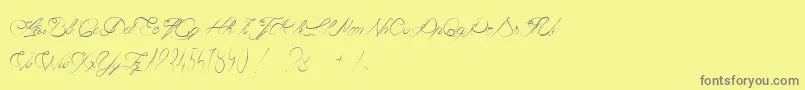 CaviarDeDiane-Schriftart – Graue Schriften auf gelbem Hintergrund