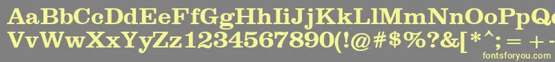 ClarendonРџРѕР»СѓР¶РёСЂРЅС‹Р№-Schriftart – Gelbe Schriften auf grauem Hintergrund