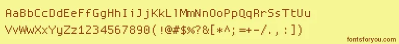 Шрифт Proggysquarett – коричневые шрифты на жёлтом фоне