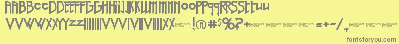 RedRightHand-fontti – harmaat kirjasimet keltaisella taustalla