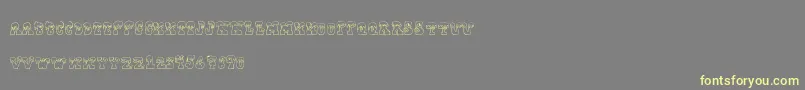 Frostyholiday-Schriftart – Gelbe Schriften auf grauem Hintergrund