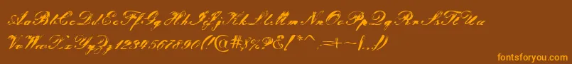 Tragedia Font – Orange Fonts on Brown Background