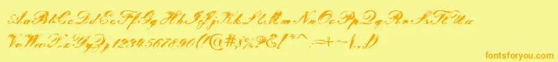フォントTragedia – オレンジの文字が黄色の背景にあります。
