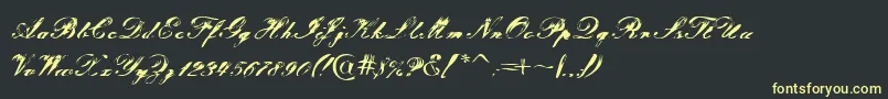 Tragedia Font – Yellow Fonts on Black Background