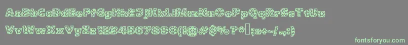 More about Metalic Font Metalic Font – Green Fonts on Gray Background