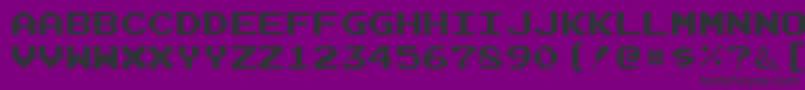 JoystixMonospace Font – Black Fonts on Purple Background