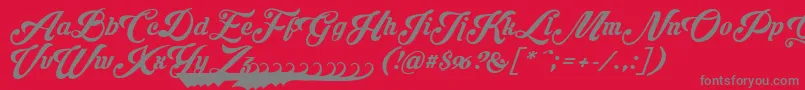 Krinkesdecorpersonal-Schriftart – Graue Schriften auf rotem Hintergrund