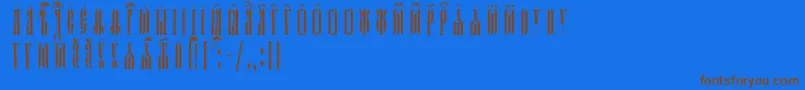 KathismaUcsSpacedout Font – Brown Fonts on Blue Background