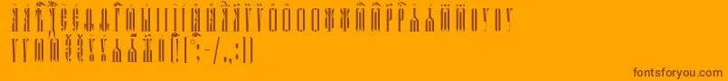 KathismaUcsSpacedout Font – Brown Fonts on Orange Background