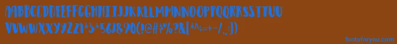 Observantdemo-fontti – siniset fontit ruskealla taustalla