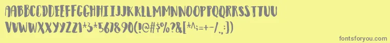 フォントObservantdemo – 黄色の背景に灰色の文字