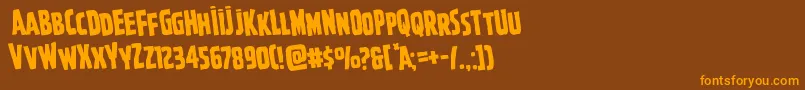 Ghoulishintentrotate-Schriftart – Orangefarbene Schriften auf braunem Hintergrund