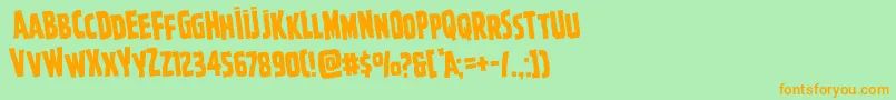 Ghoulishintentrotate-Schriftart – Orangefarbene Schriften auf grünem Hintergrund