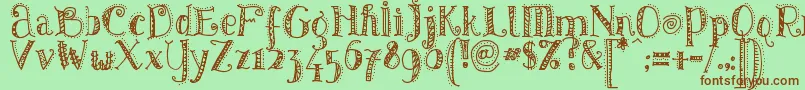 PatternsDots Font – Brown Fonts on Green Background