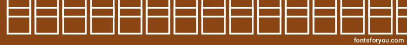Czcionka Mathsymbols3 – białe czcionki na brązowym tle
