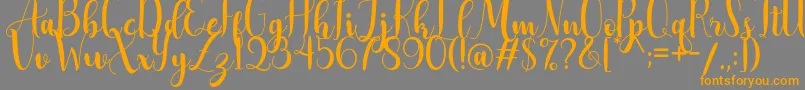 AdreenascriptDemo Font – Orange Fonts on Gray Background
