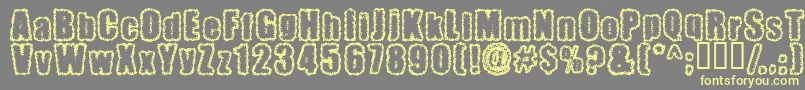 Pinniepoker Font – Yellow Fonts on Gray Background