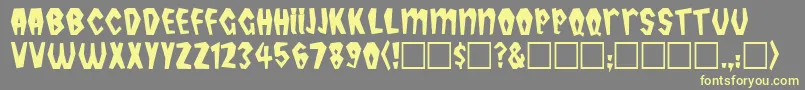 TropicanaPlain-Schriftart – Gelbe Schriften auf grauem Hintergrund