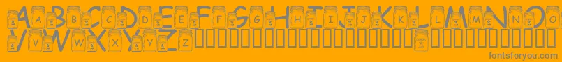 fuente LmsCanningWithTheInlaws – Fuentes Grises Sobre Fondo Naranja