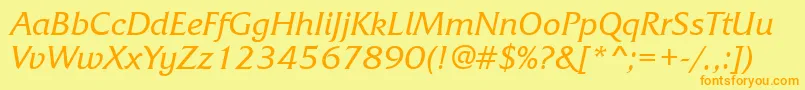 フォントFrizquadratacttItalic – オレンジの文字が黄色の背景にあります。