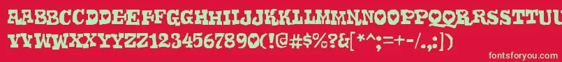 GomokurgRegular Font – Green Fonts on Red Background