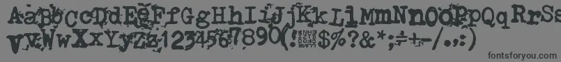 TypistysDirt-Schriftart – Schwarze Schriften auf grauem Hintergrund
