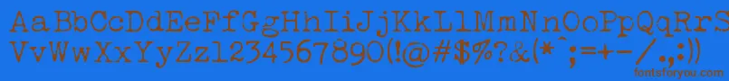 LuckyTypewriter Font – Brown Fonts on Blue Background