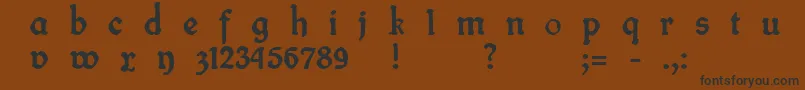 フォントFineFrakturB – 黒い文字が茶色の背景にあります