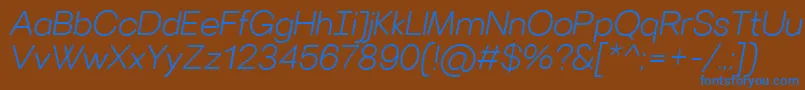 VillerayroundedLightitalic-Schriftart – Blaue Schriften auf braunem Hintergrund