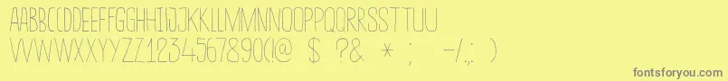 DkSucoDeLaranja Font – Gray Fonts on Yellow Background