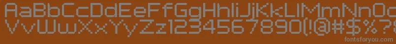 フォントPfTempestaSevenExtended – 茶色の背景に灰色の文字