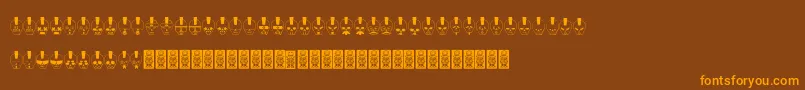フォントSkulldcoxy – オレンジ色の文字が茶色の背景にあります。
