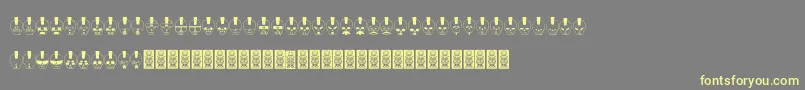 Skulldcoxy Font – Yellow Fonts on Gray Background