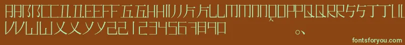 フォントRomajimincho – 緑色の文字が茶色の背景にあります。