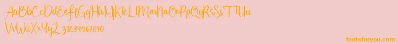 Firdaus Font – Orange Fonts on Pink Background