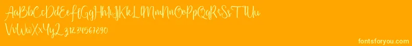 Firdaus Font – Yellow Fonts on Orange Background