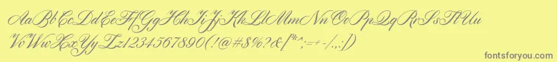 フォントCylburn – 黄色の背景に灰色の文字