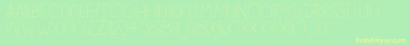 フォントDkSleepyTime – 黄色の文字が緑の背景にあります