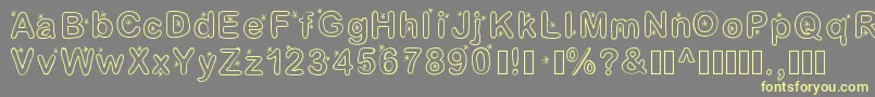 Lettreetoile Font – Yellow Fonts on Gray Background