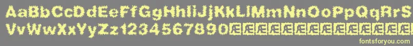 フォントFrizzedBrk – 黄色のフォント、灰色の背景