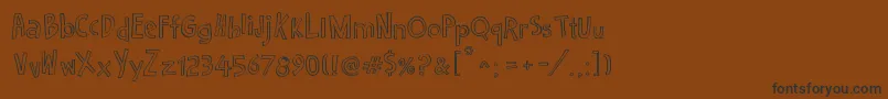 Cartoon2Package Font – Black Fonts on Brown Background