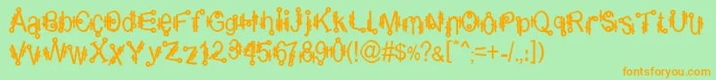 Shamantics-Schriftart – Orangefarbene Schriften auf grünem Hintergrund