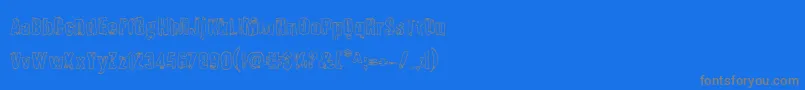 Quarrystoneout Font – Gray Fonts on Blue Background