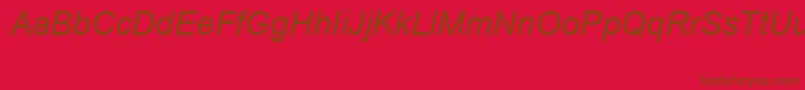 Czcionka ArialSpecialG1Italic – brązowe czcionki na czerwonym tle