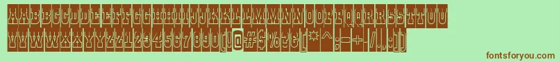 フォントGildiatitulcmgrBold – 緑の背景に茶色のフォント