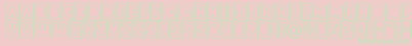 GrotocmotldnRegular Font – Green Fonts on Pink Background