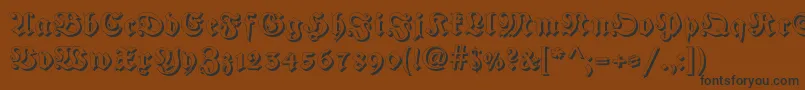 フォントFraktur Shadowed – 黒い文字が茶色の背景にあります