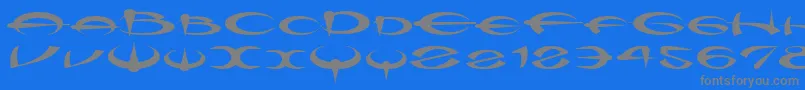 フォントMyquerdd – 青い背景に灰色の文字