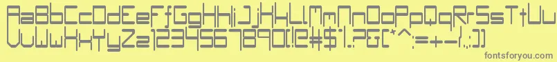 Bumple-fontti – harmaat kirjasimet keltaisella taustalla