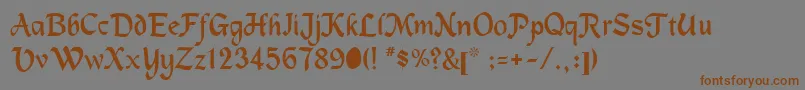 Machuman Font – Brown Fonts on Gray Background
